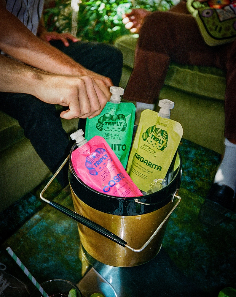 Margarita, Mojito and Cosmo Triply pouches in an ice bucket